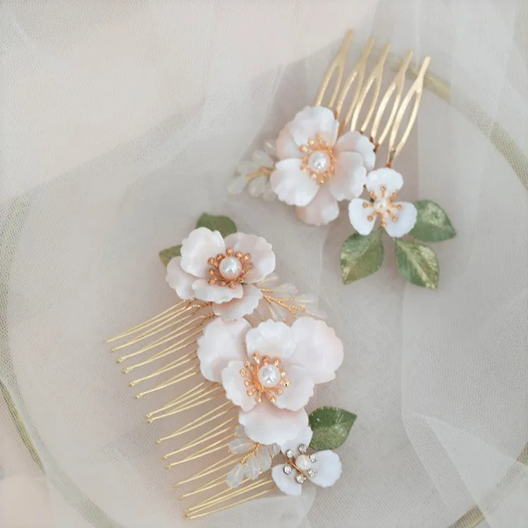 C193. white ivory florals bridal hair comb set