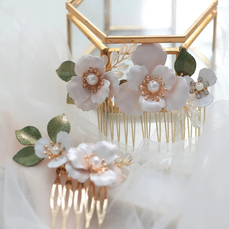 C193. white ivory florals bridal hair comb set