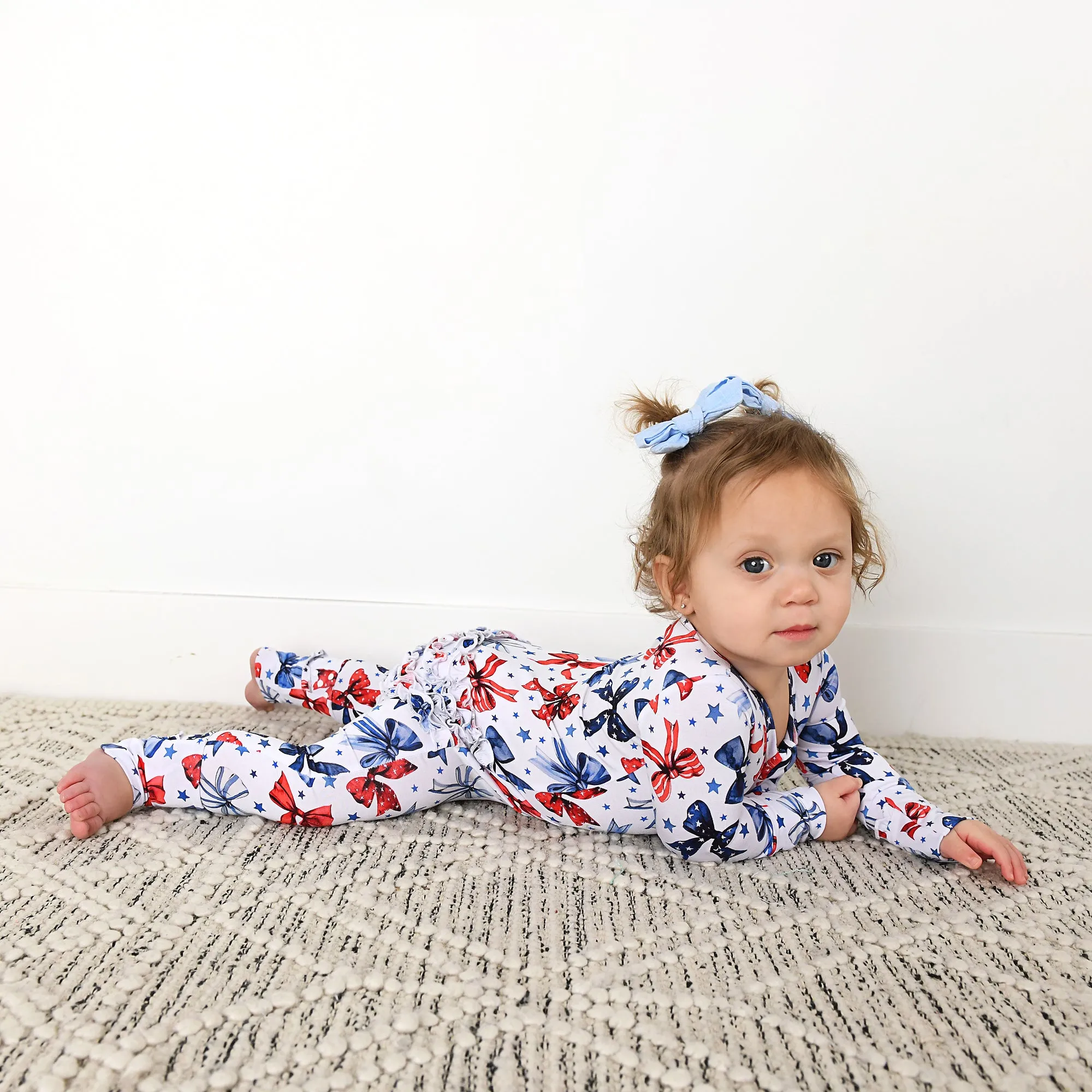 Eleanor Bows RUFFLE ZIP