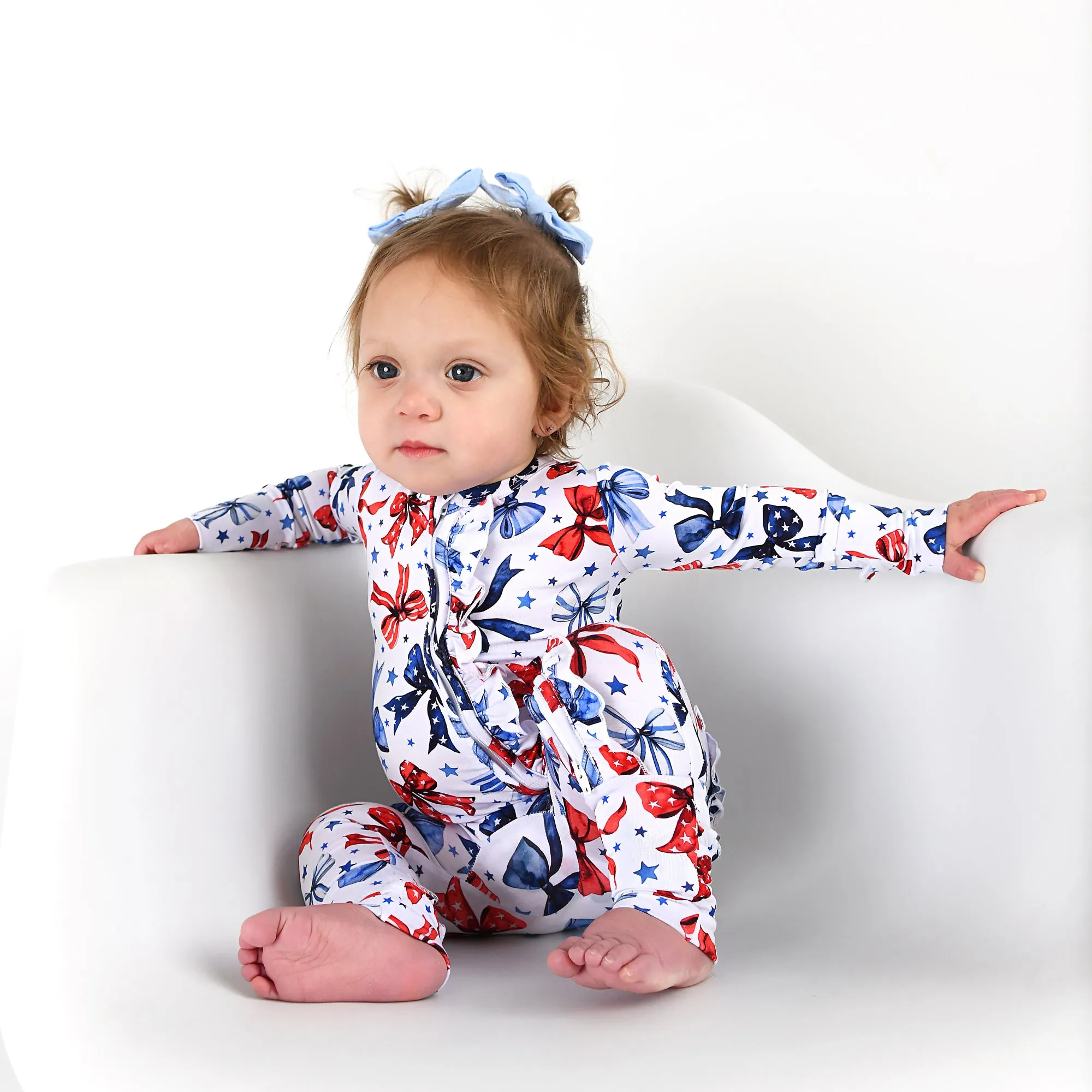 Eleanor Bows RUFFLE ZIP