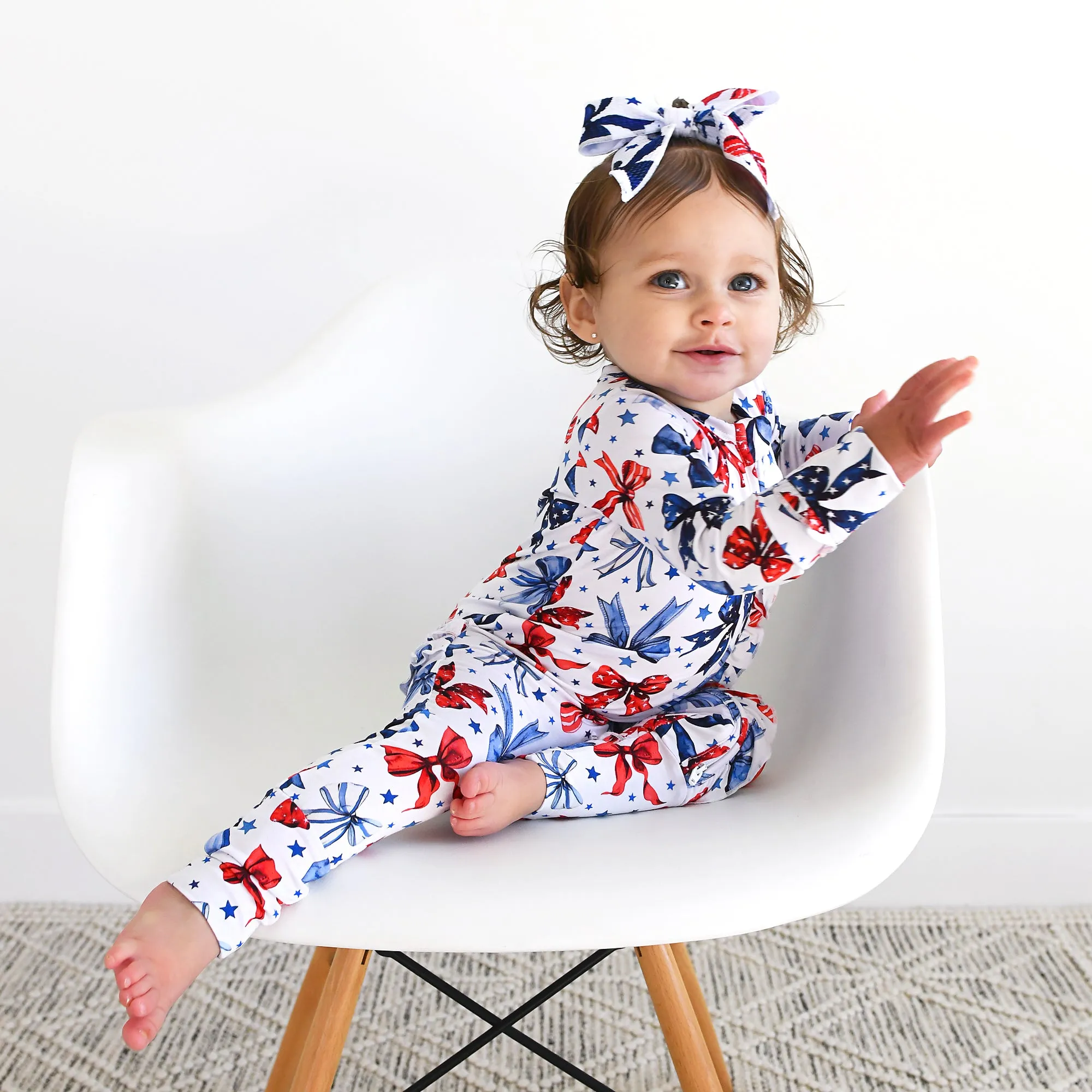 Eleanor Bows RUFFLE ZIP