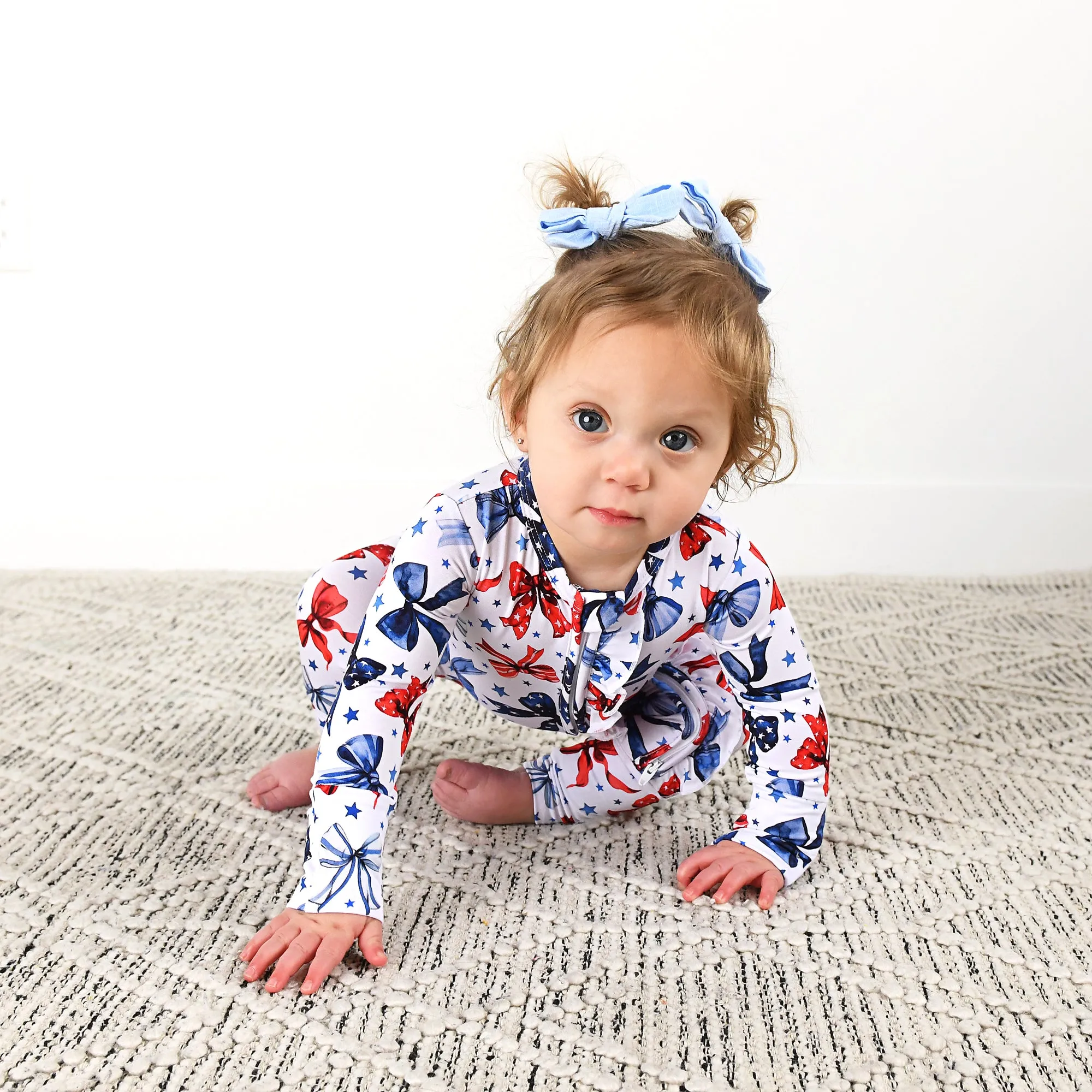 Eleanor Bows RUFFLE ZIP