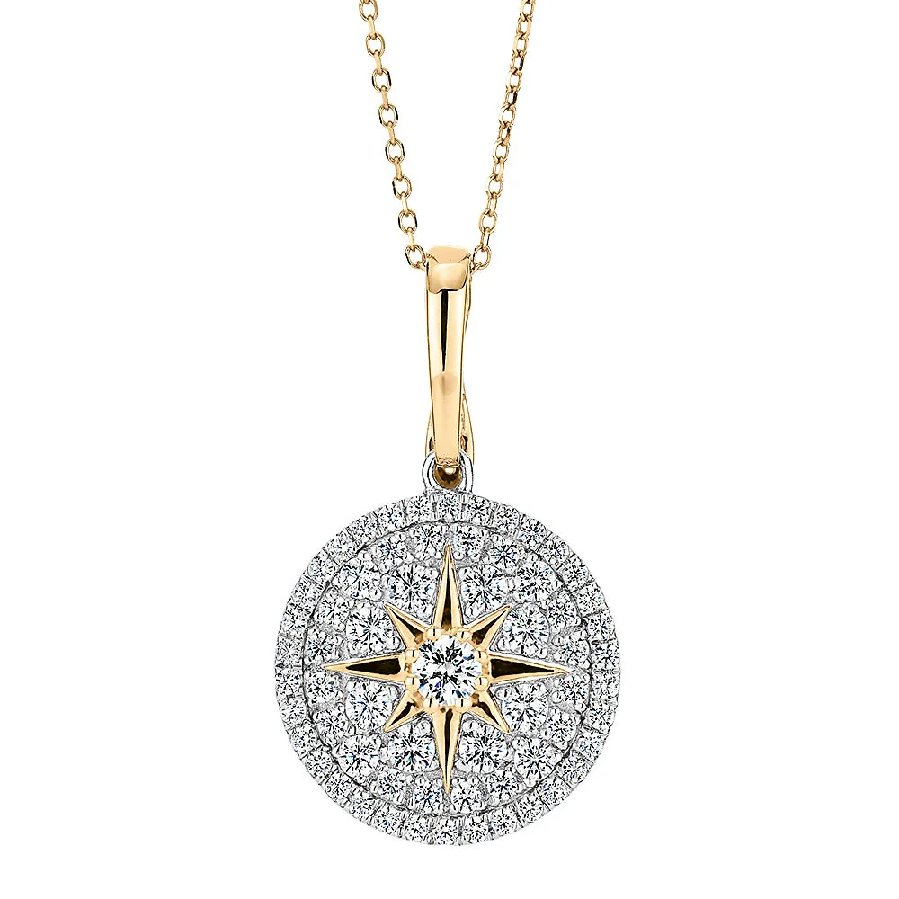 Fancy pendant with 0.95 carats* of diamond simulants in 10 carat yellow gold and sterling silver