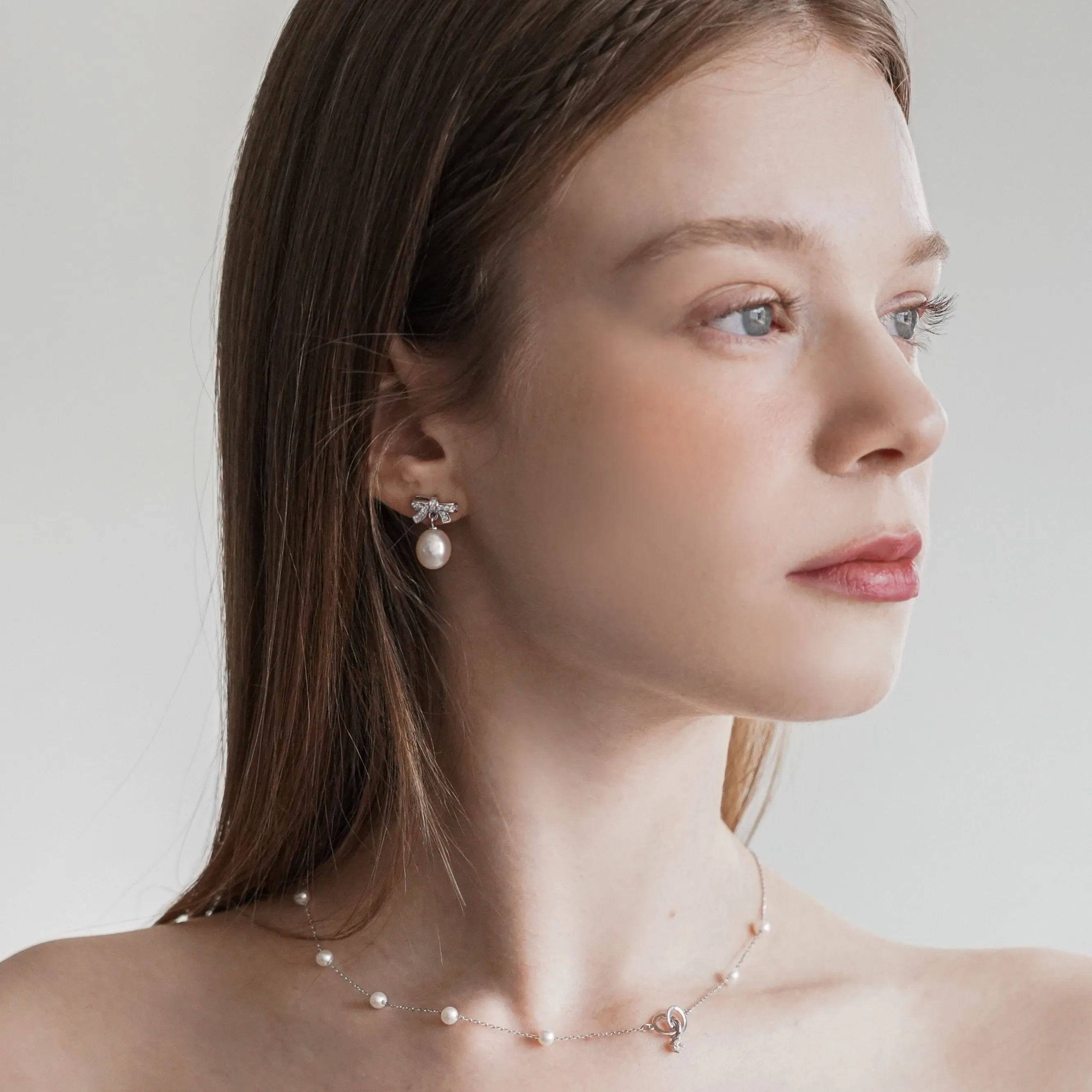 SPARKLING BOW WITH PEARL EARRINGS