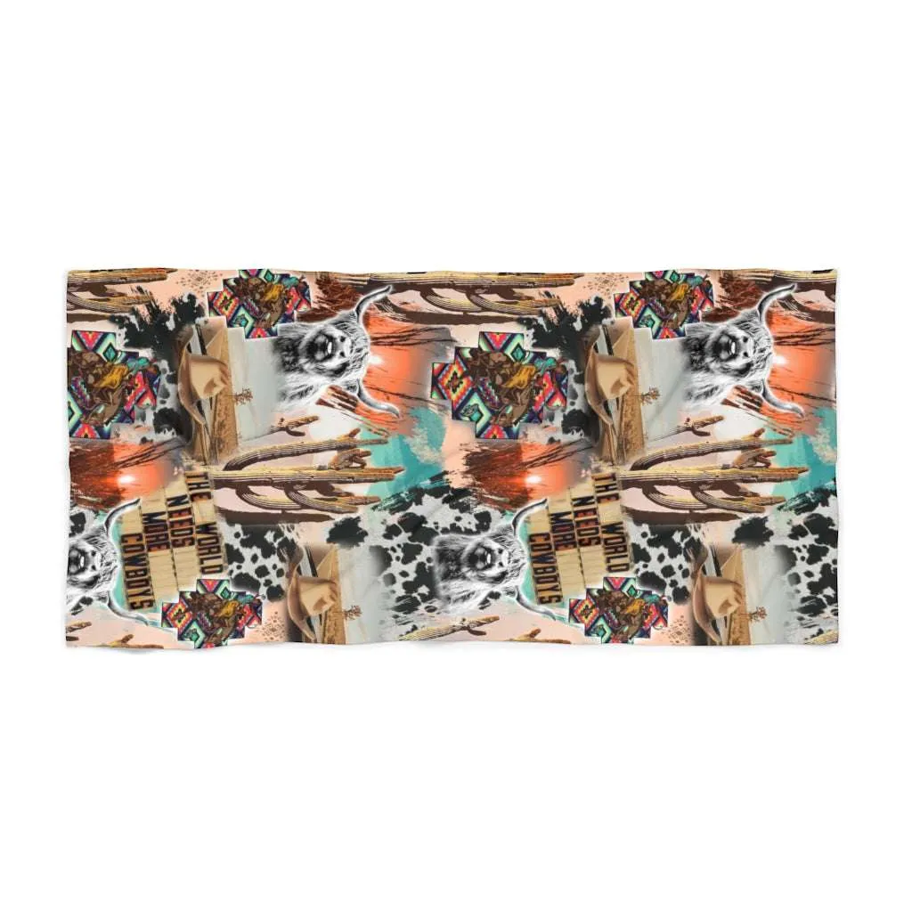 The World Needs More Cowboys Beach Towel